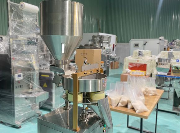 Chi phí máy định lượng cốc đong