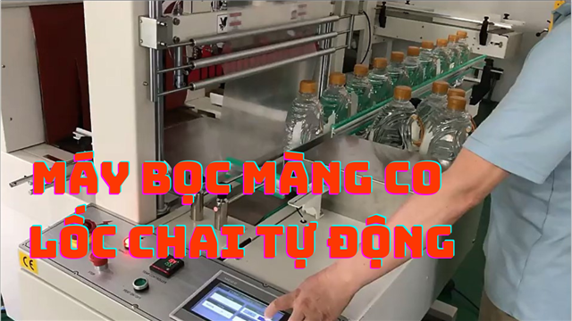 Bàn giao máy đóng gói co màng lốc chai khách hàng ở Hà Nam